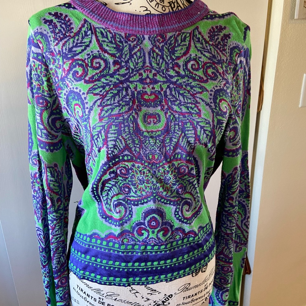 Free People colorful sweater. Very stylish and comfy.